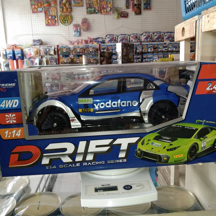 DRIFT RACING Mobil Remote 4WD RC Drift Racing 1:14 Charger RC DRIFT SAN ZUAN 4WD 1:14 DUS BIRU