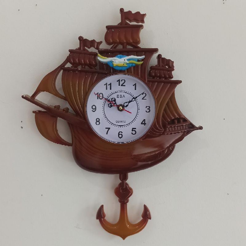 jam dinding unik bandul bunyi model kapal jangkar