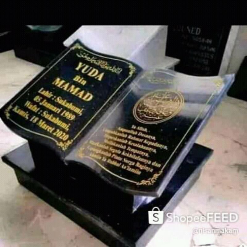 Kepala makam batu granit