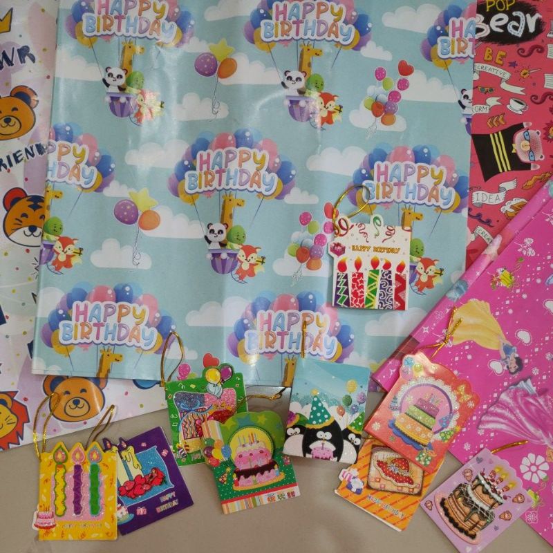 

Packing Tambahan Kertas kado+kartu ucapan