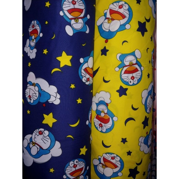 Bahan Kain Sprei Meteran Motif Anak Karakter Kartun Doraemon Bahan Buat Urung Kasur Disperse Katun P