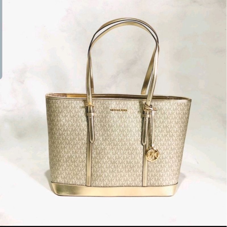 MK JET SET TRAVEL TOTE BAG PALE GOLD
