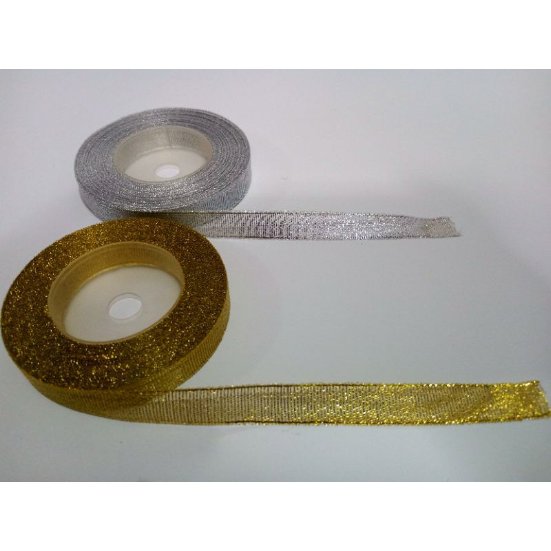 

Pita Glitter emas dan perak (gold & silver) ukuran 1/2 inchi atau 1,5cm dijual per meter