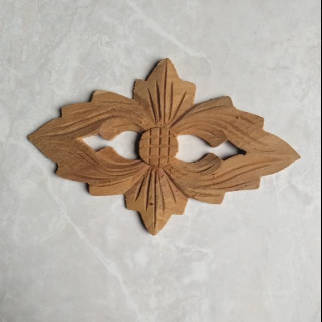 Ornamen ukiran kayu jati