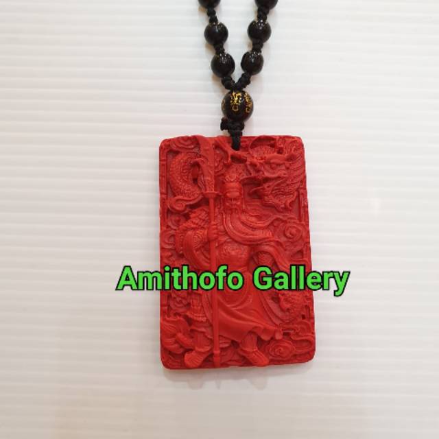 Liontin batu merah Kwankong