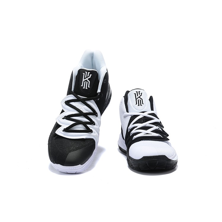 one black and one white basketball shoes