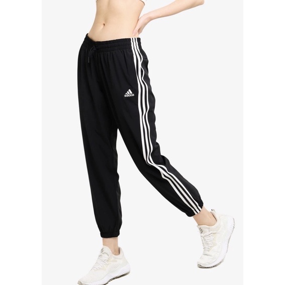 JUAL CELANA ADIDAS ESSENTIAL 3 STRIPE WOVEN 7/8 PANTS BLACK WHITE