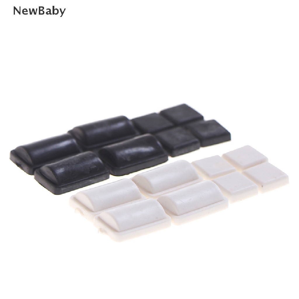Newbaby 8pcs / set Cover Sekrup Kaki Bahan Karet Silikon Warna Hitam / Putih Untuk Konsol WII