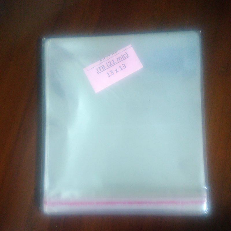 

Plastik OPP 13 x 13 bening isi 100 lembar/Plastik Seal/Plastik lem/Plastik Kue/Kemasan Sachet