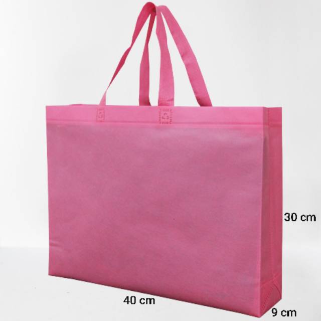

Goodie bag / tas spunbond / tas souvernir polos uk (30×40×9)