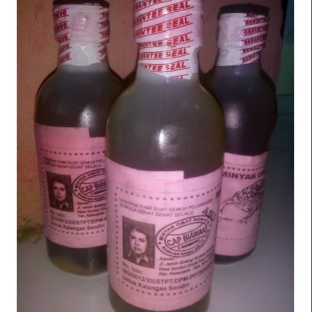 Minyak Urut Tradisional Karo Cap Biawak