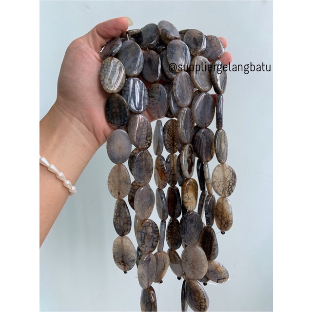 batu Penden simba oval rhodolite dalmantion 2 x 4 cm hitam putih serat