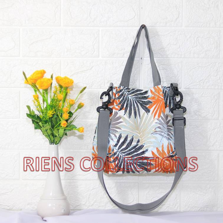 RIENS COLLECTIONS. SLING BAG TAS SELEMPANG KANVAS MOTIF  FLORAL PALM ORANGE. Tas Jogja Tas Kanvas Tas Souvenir Jogja