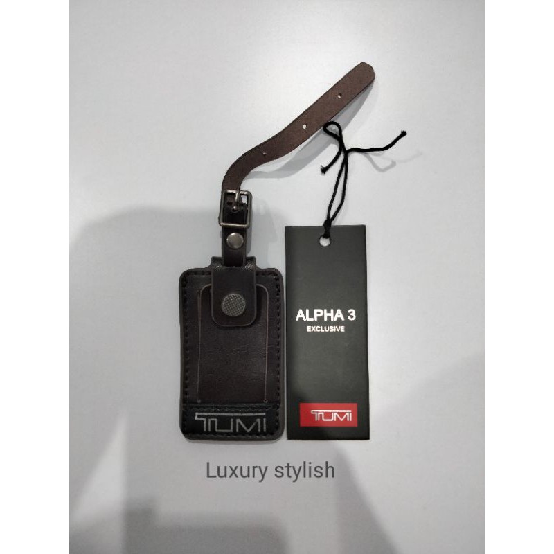 

Name Tag Tumi Tag Tumi Coklat Tua