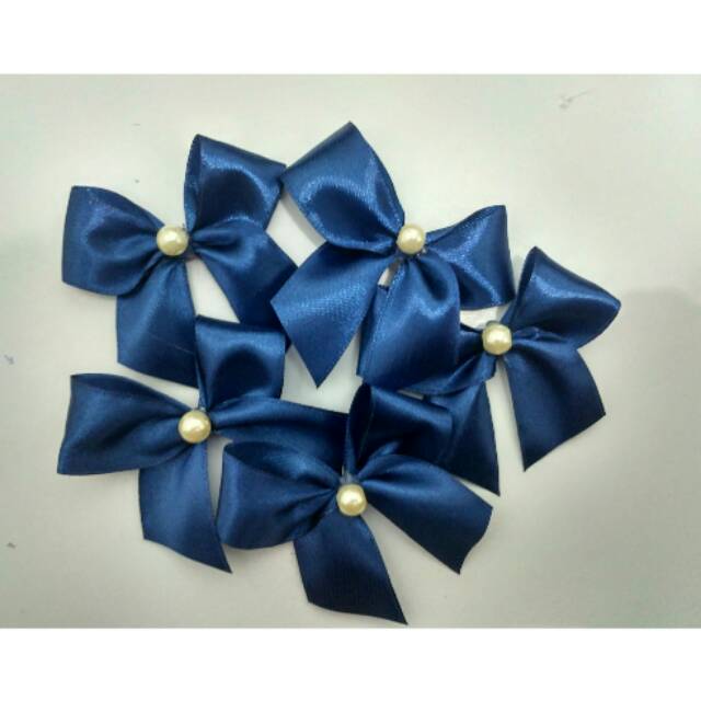 

PITA SOUVENIR MUTIARA BESAR