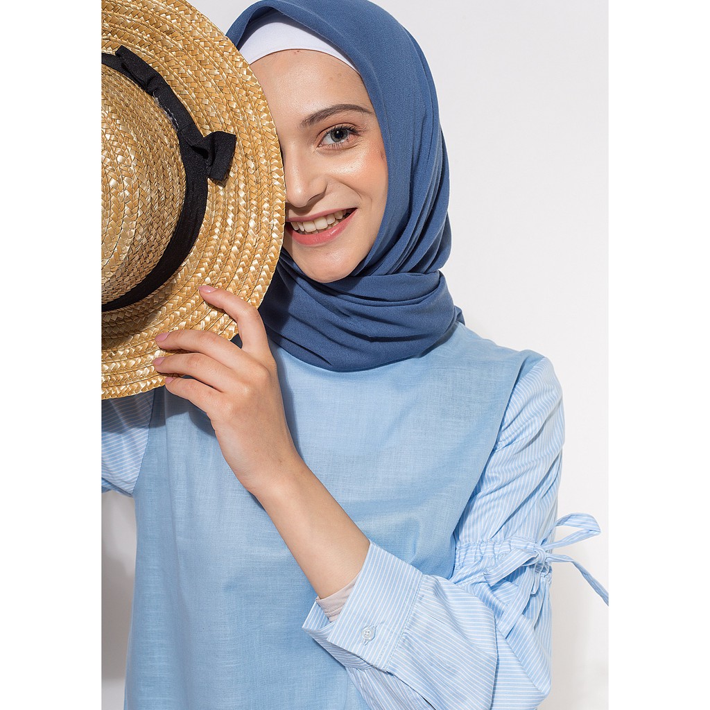 

Rindra Top Soft Blue