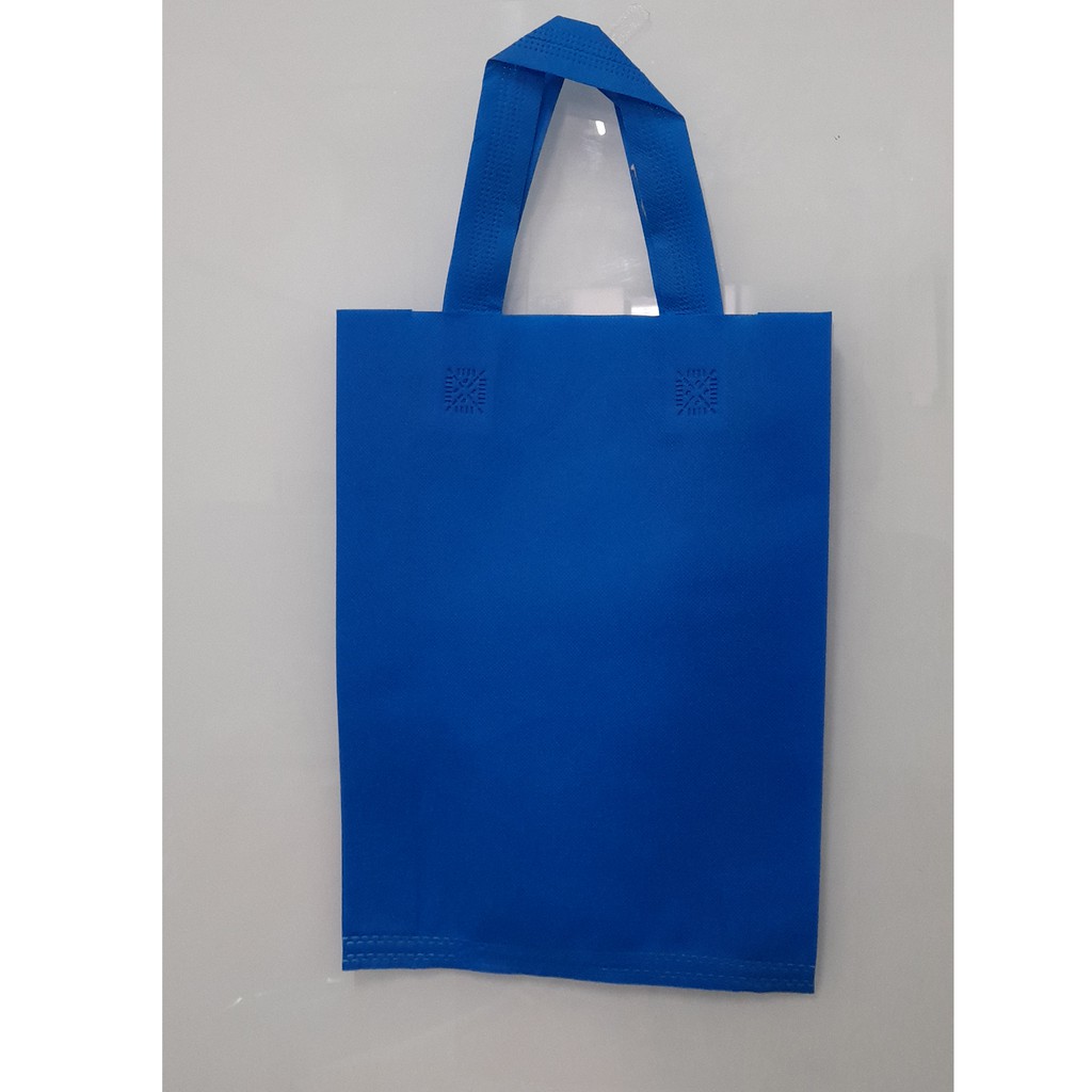 

Tas Press Spunbound Tali Goodie Bag Tas Belanja Warna Biru Turkis 30 cm x 40 cm
