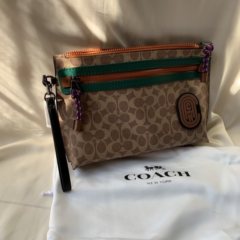 COACH CLUTCH ACADEMY POUCH IN SIGNATURE CANVAS WITH PATCH ORIGINAL - BROWN