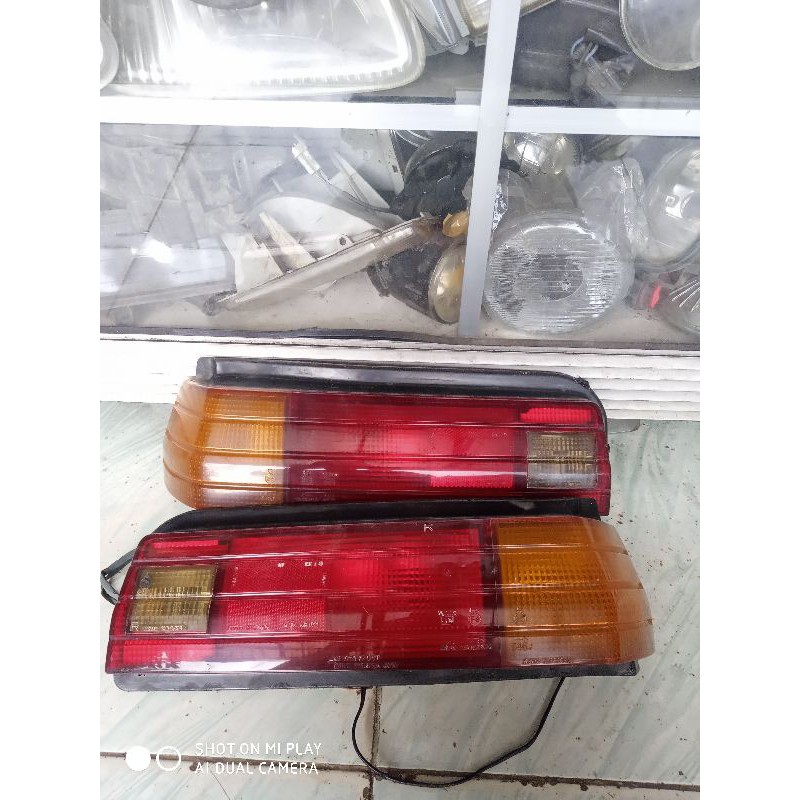 STOPLAMP DAIHATSU CHARADE CX 1988 - 1995 ORIGINAL