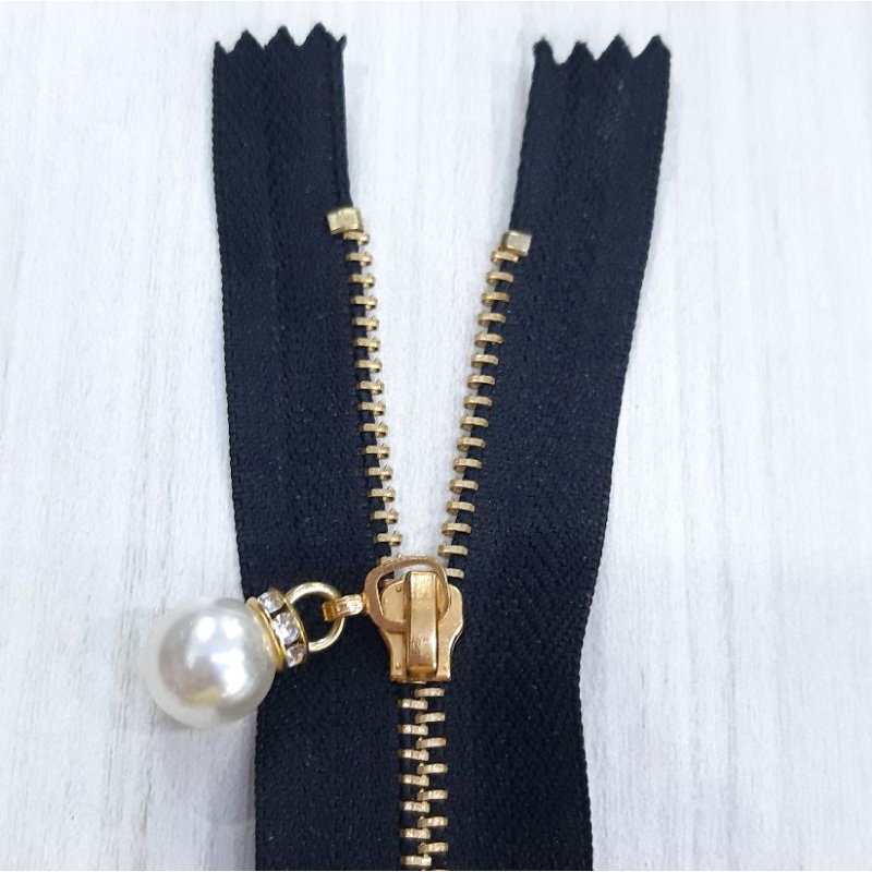 Resleting, zipper kuningan variasi pearl(imitasi)slider-kepala mutiara/monte, YKK ukuran 15cm - 30cm