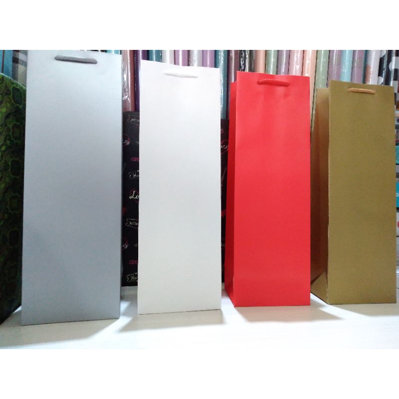 

Paperbag Polos ukuran 12X36X9 cm
