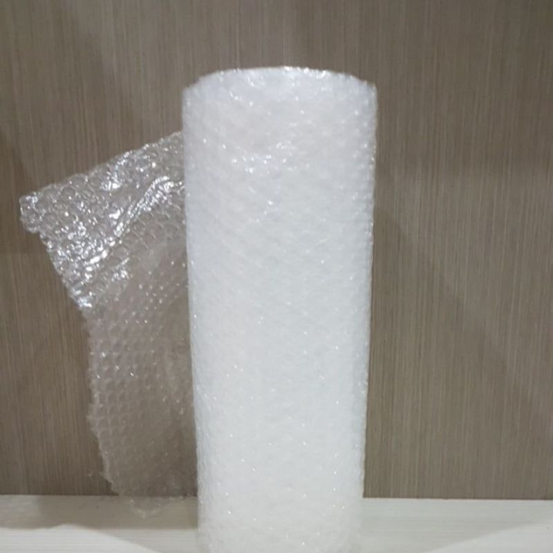 

Bubble wrap dan kardus untuk packing aman