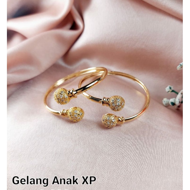 gelang anak xuping warnanya emas