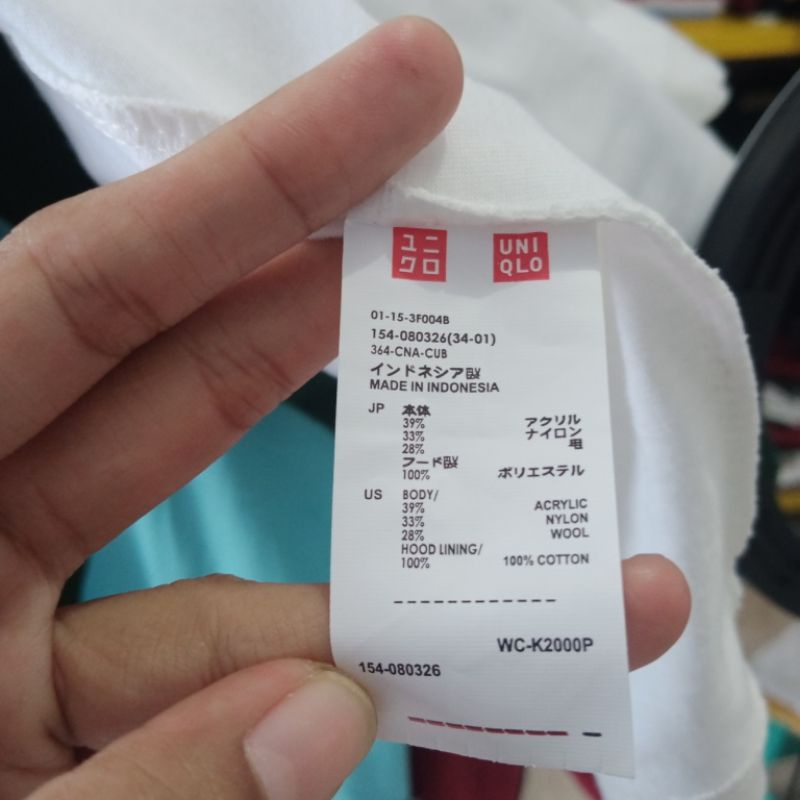 Kaos uniqlo pria polos motif logo bordir-1