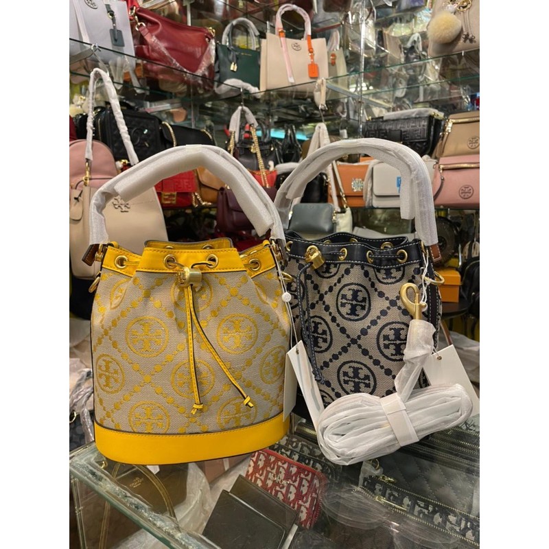 TAS WANITA BRANDED TORY BURCH BUCKET SERUT NAVY, YELLOW SLING BAG