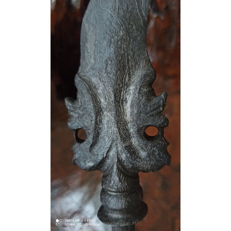 

Tombak Naga kembar