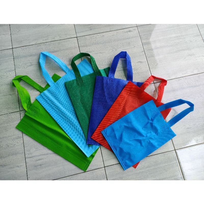 Tas Kain Spunbond Lusinan (isi 12 pcs)_ GOODIE BAG Handle Lipat Samping Polos Tebal