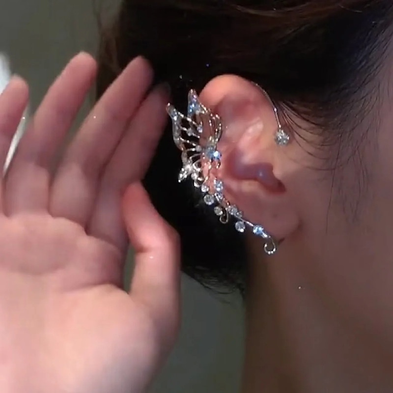 Anting Klip Desain Sayap Kupu-Kupu Hollow Hias Kristal Berlian Imitasi Gaya Korea Untuk Wanita