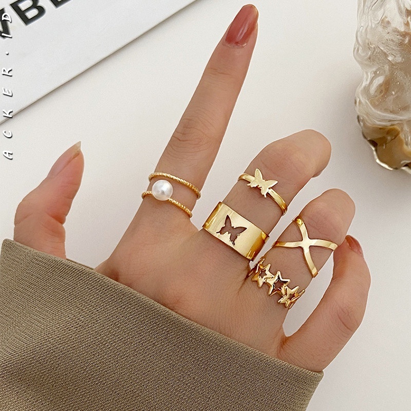 5pcs / Set Cincin Desain Kupu-Kupu Hollow Cross Aksen Mutiara Untuk Wanita