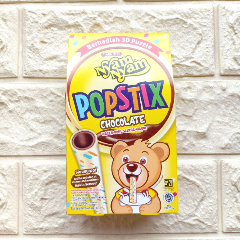 

Nyam Nyam NyamNyam Popstix Chocolate 48gr Wafer Roll Warna Warni Coklat Makanan Snack Cemilan Anak