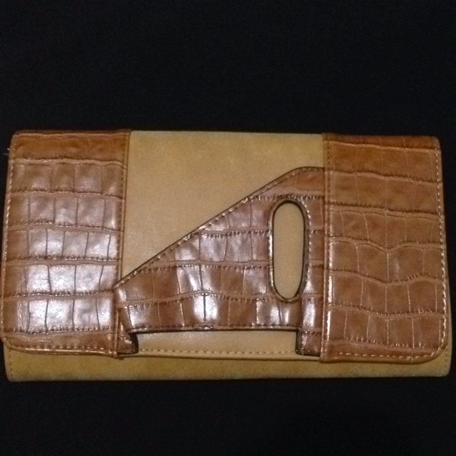 clutch huer tan