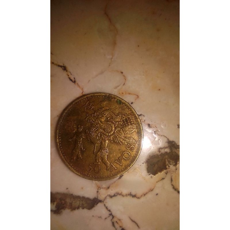 coin kuno asli dari macau