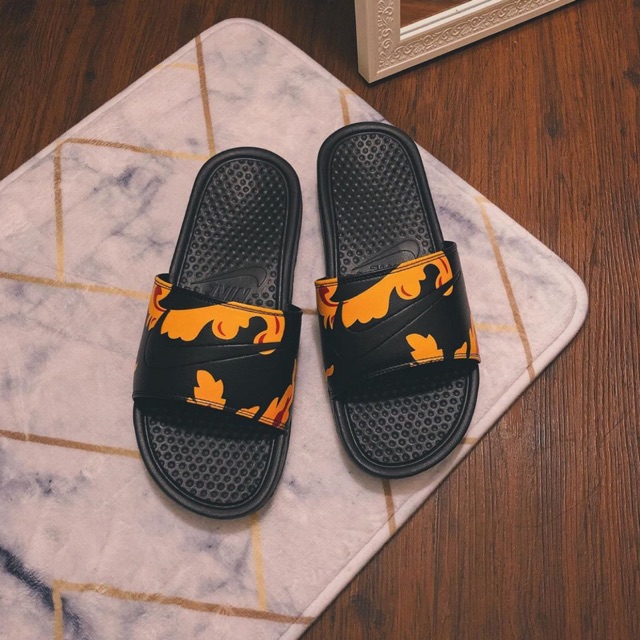 nike benassi slides orange