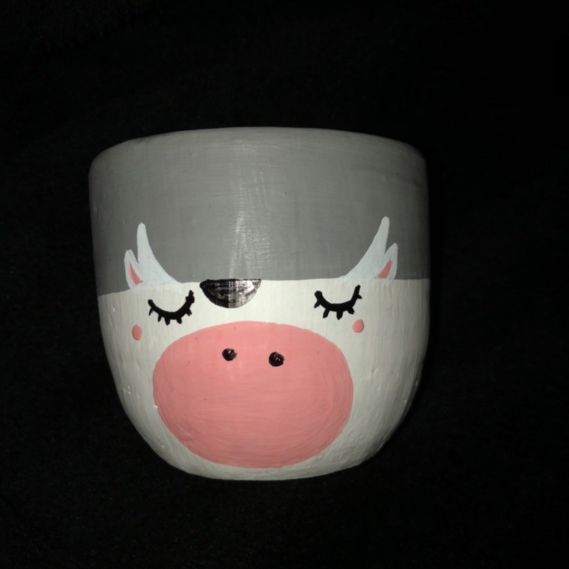 

Pot gerabah lukis sapi