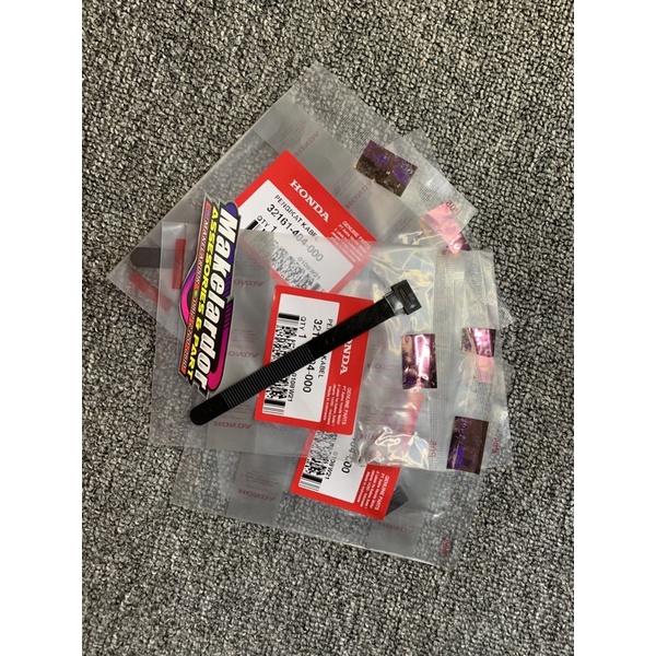 Pengikat kabel pada stang motor