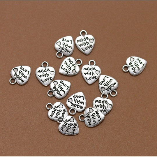 10pcs Liontin Bentuk Hati Bahan Metal Warna Silver Untuk Gelang Dan Kalung Charms