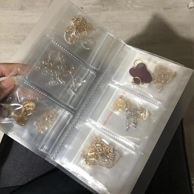 Album Penyimpanan Perhiasan Cincin Kalung Anting 288 Grid Transparan Tahan Debu