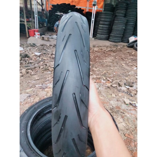 BAN MOTOR SUPRA-REVO-DLL UKURAN70/90ring17(depan)