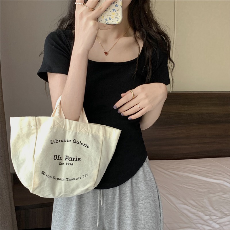 Bahu lengan pendek T-shirt wanita musim panas 2022 baru tipis dan manis gadis panas murni keinginan