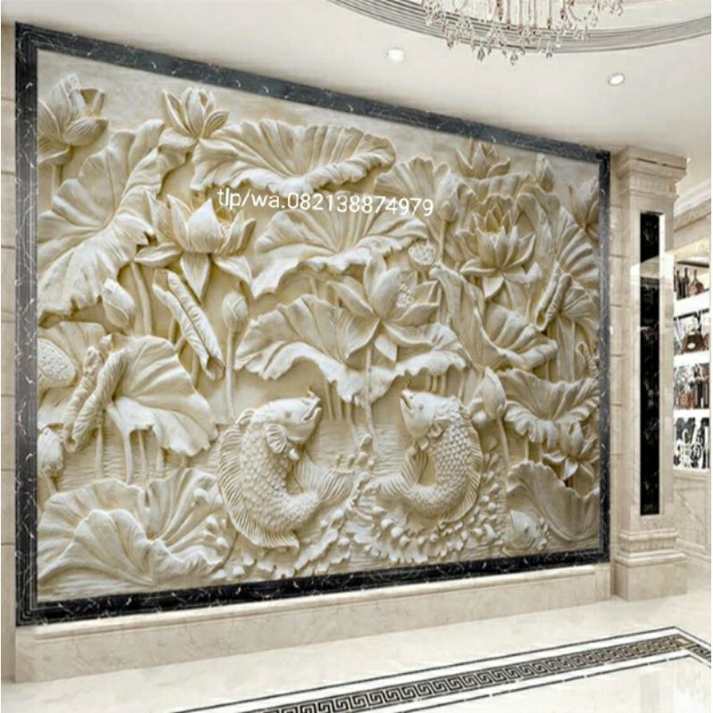 relief batu alam paras jogya motif ikan dan daun lotus