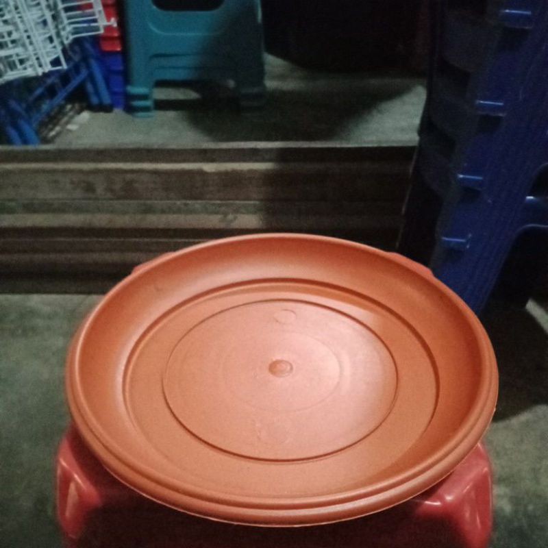 Tatakan pot bunga 30 pot 35