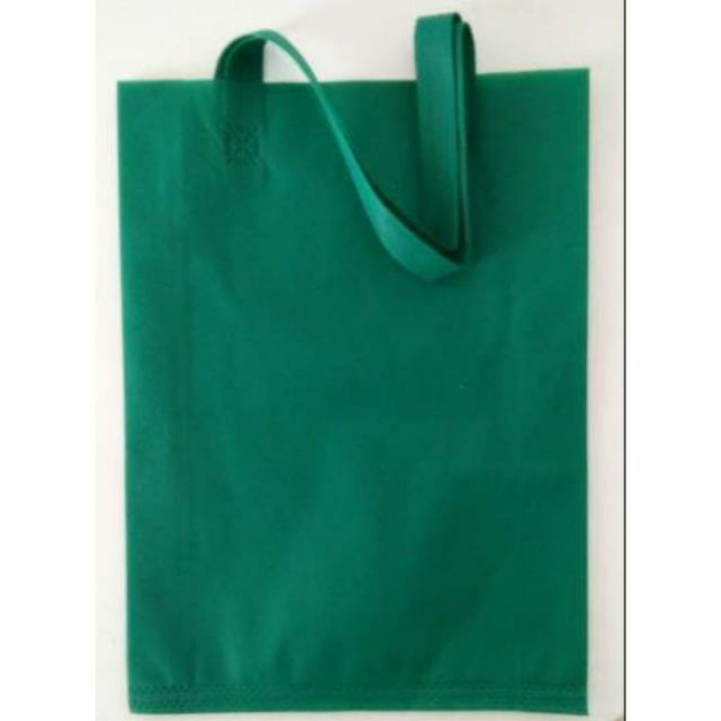 

Tas spunbond goodie bag 20x30 x10 cm ,tas kain belanja,souvenir,promosi,tas ultah,polos,sablon