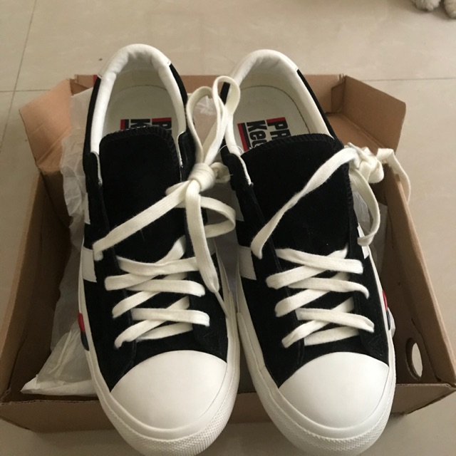 all black pro keds