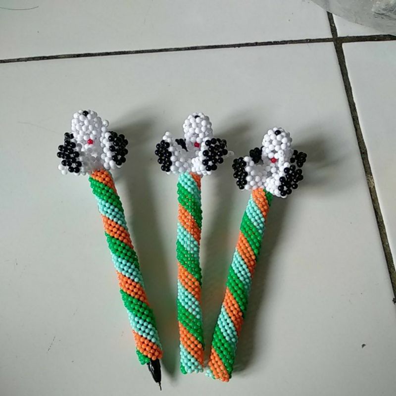

Sarung Pena Snoopy