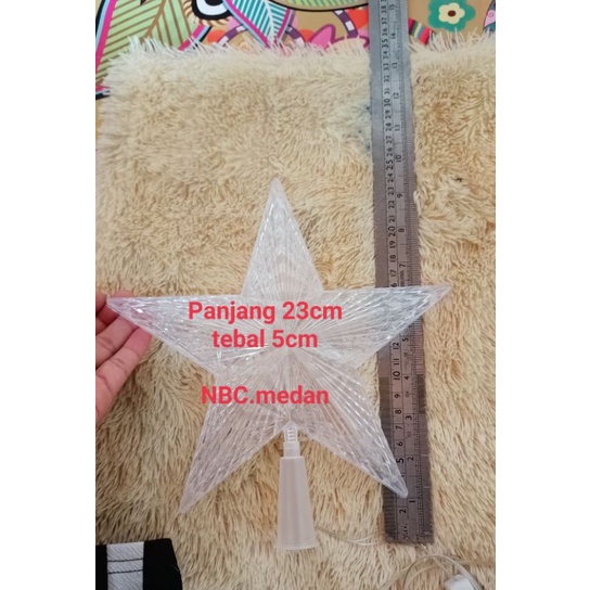 Bintang dipucuk berlampu