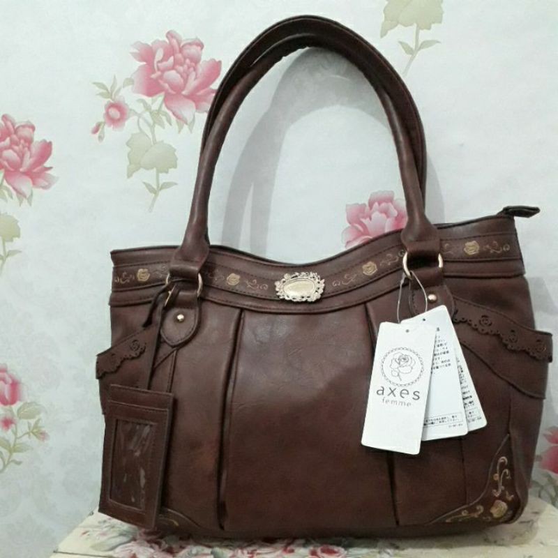 NEW SLING BAG AXES FEMME